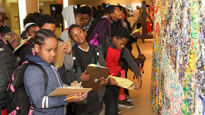 Group of school kids at the Freedom Mural